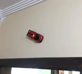 Lamborghini crni auto koji ide po zidu