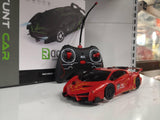 Laborghini crveni auto koji ide po zidu